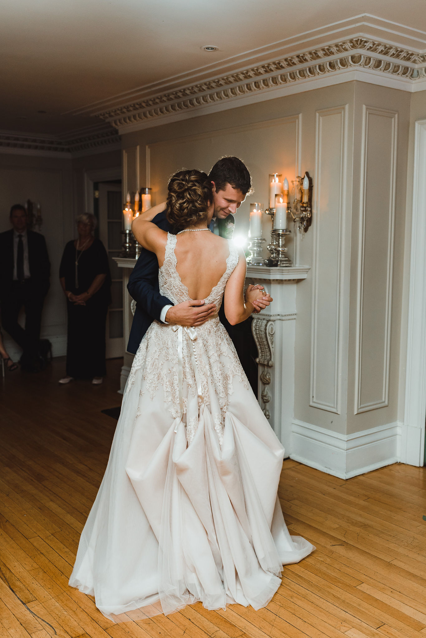 bride and groom sharing their first dance during wedding reception at La Paletta Mansion in Burlington Ontario