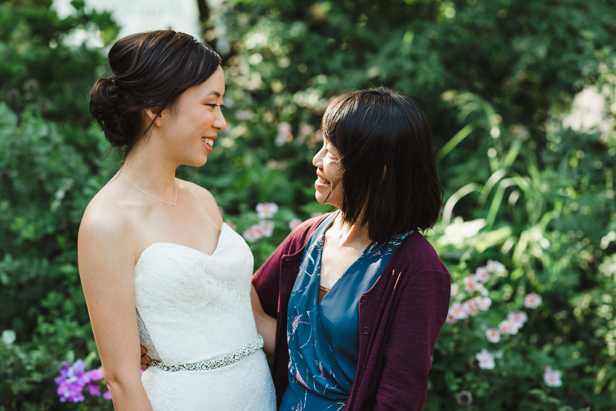 bride hugging her mother before Parisian inspired wedding at La Maquette in Toronto Ontario