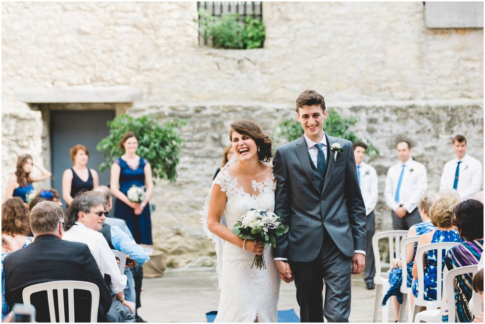 Bride and groom exiting their Goldie Mill Ruins wedding ceremony