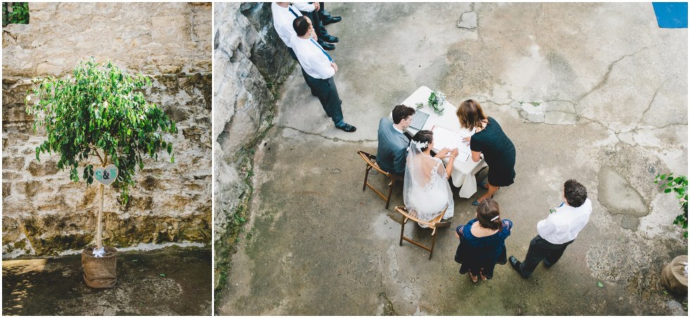 Bride and Groom signing their marriage license during the Goldie Mill Ruins wedding ceremony
