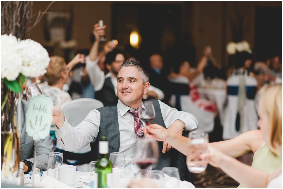 Guests toasting during wedding reception at Delta Chelsea Guelph