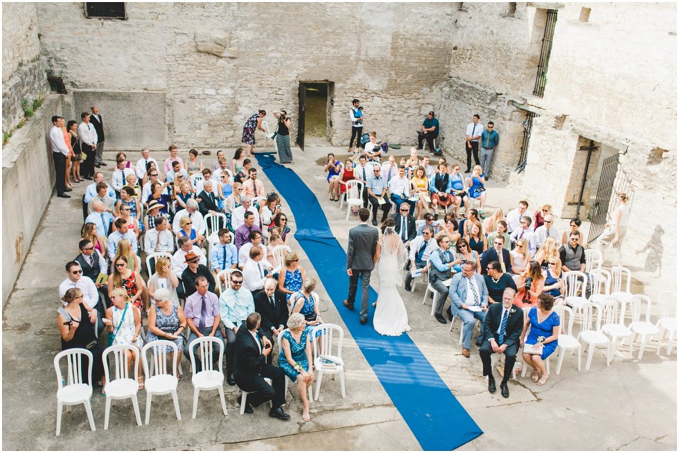 Bride and groom exiting their Goldie Mill Ruins wedding ceremony