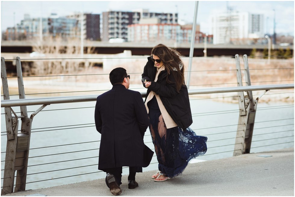 man proposing to woman on white bridge Toronto photographer Gillian Foster