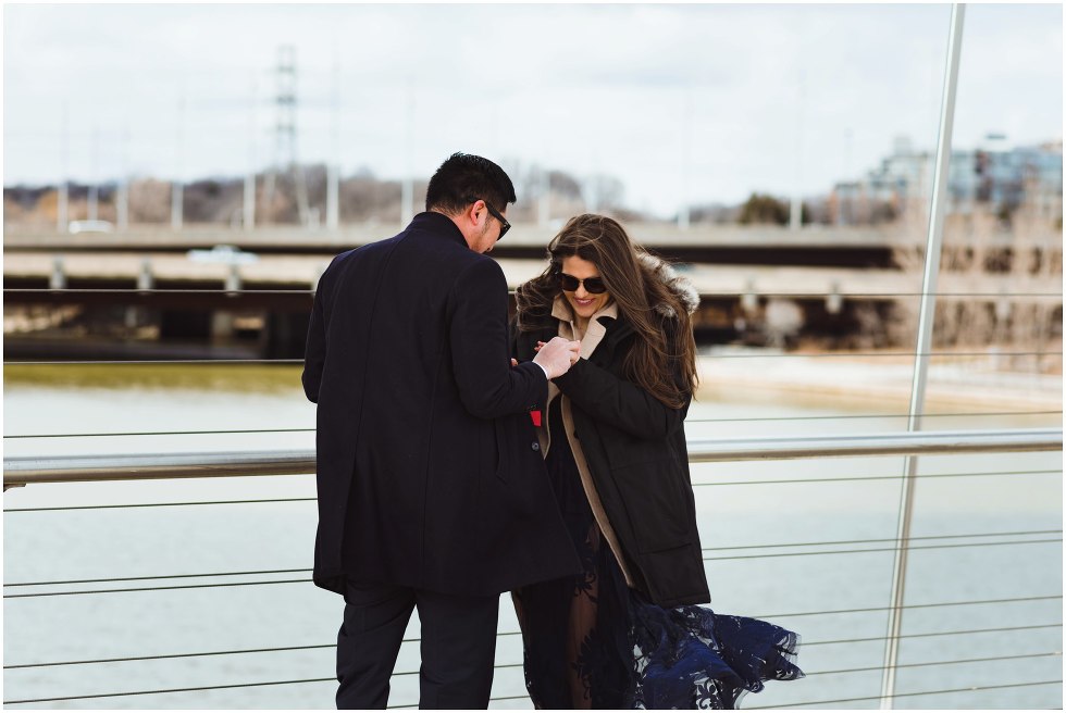 man proposing to woman on bridge Toronto 