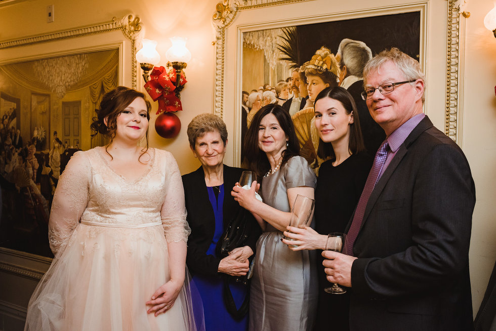 bride standing with wedding guests at Prince of Wales Hotel in Niagara