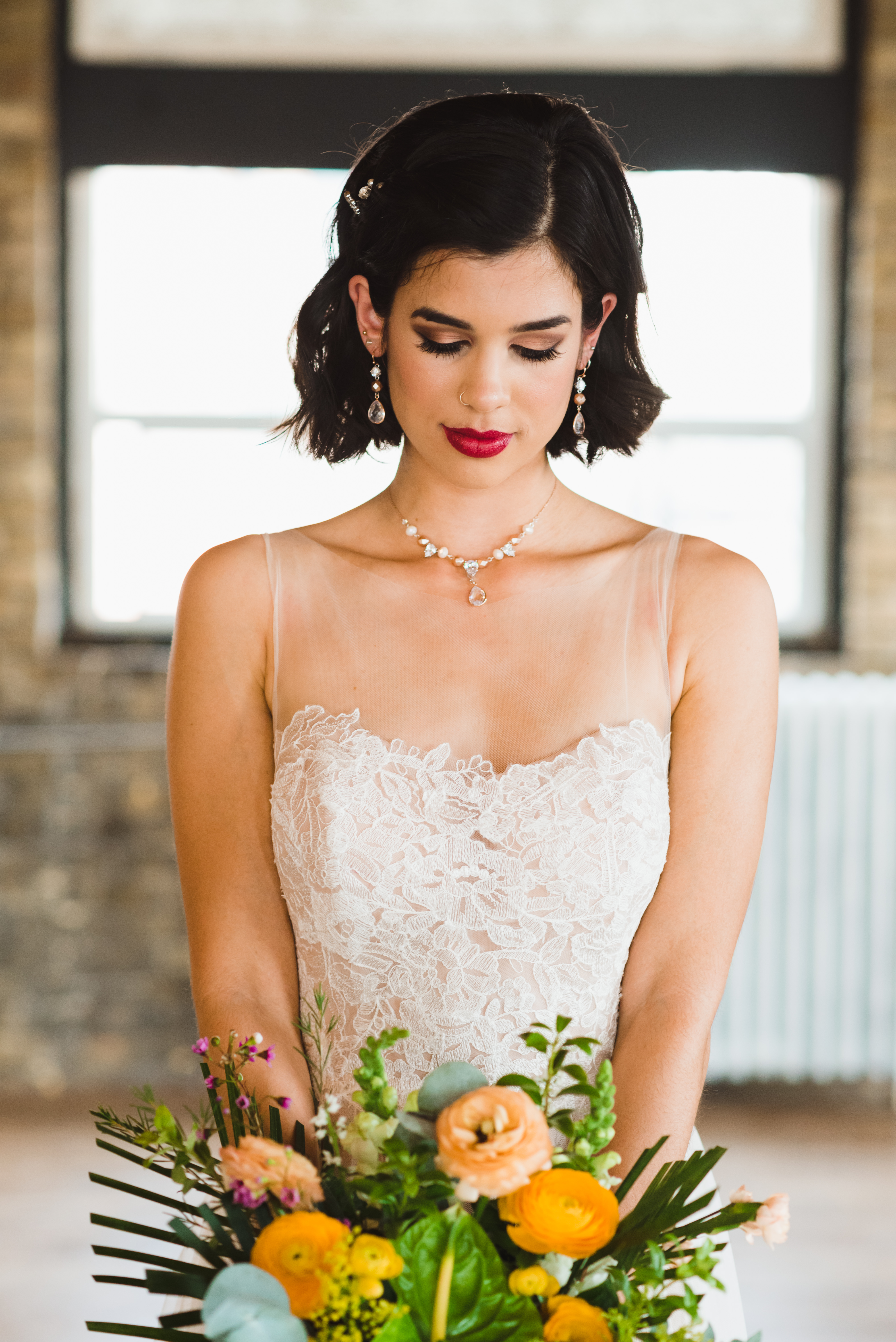 Bride holding colourful bouquet of flowers Jam Factory wedding photography