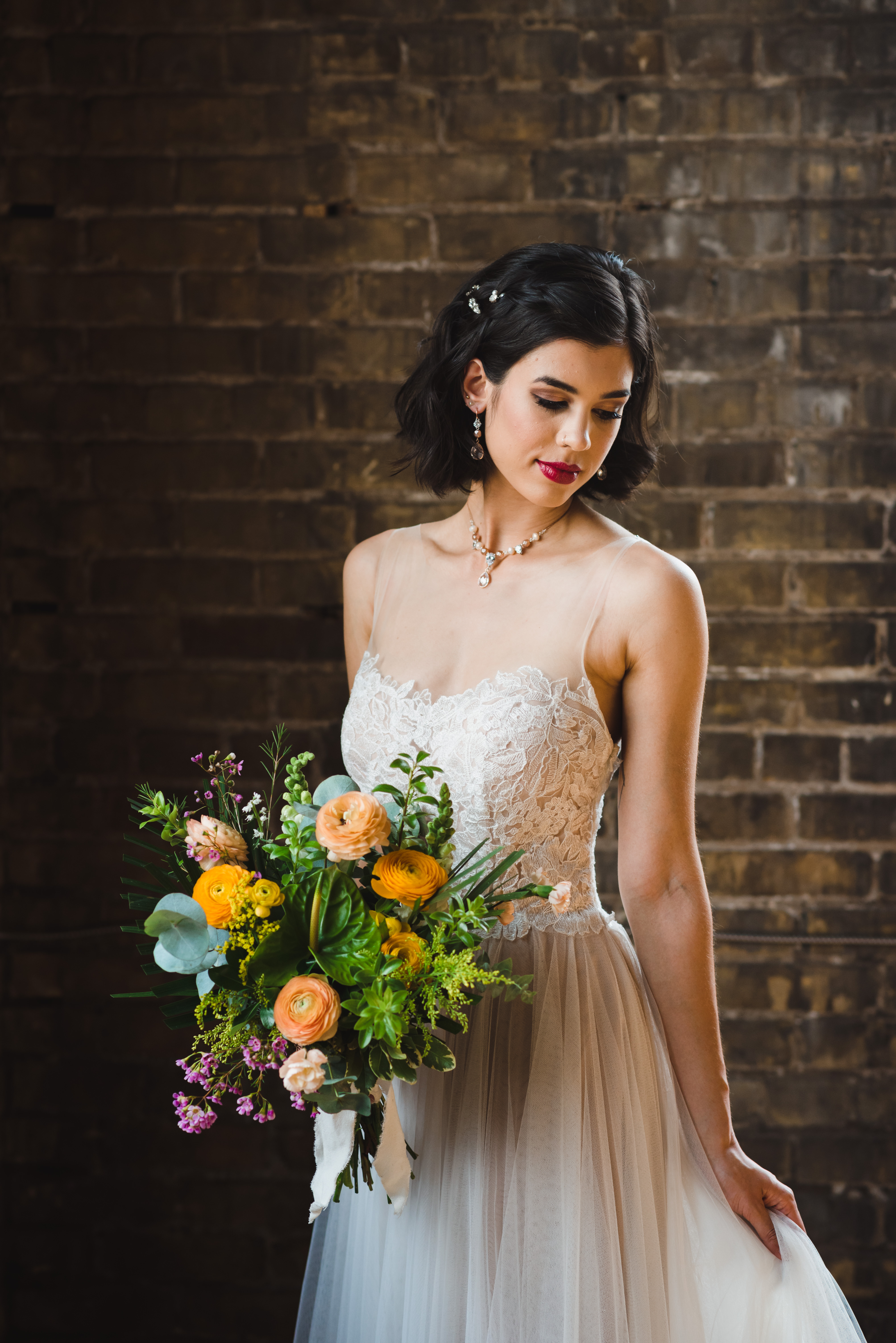 Bride holding colourful bouquet of flowers Jam Factory wedding photography Toronto