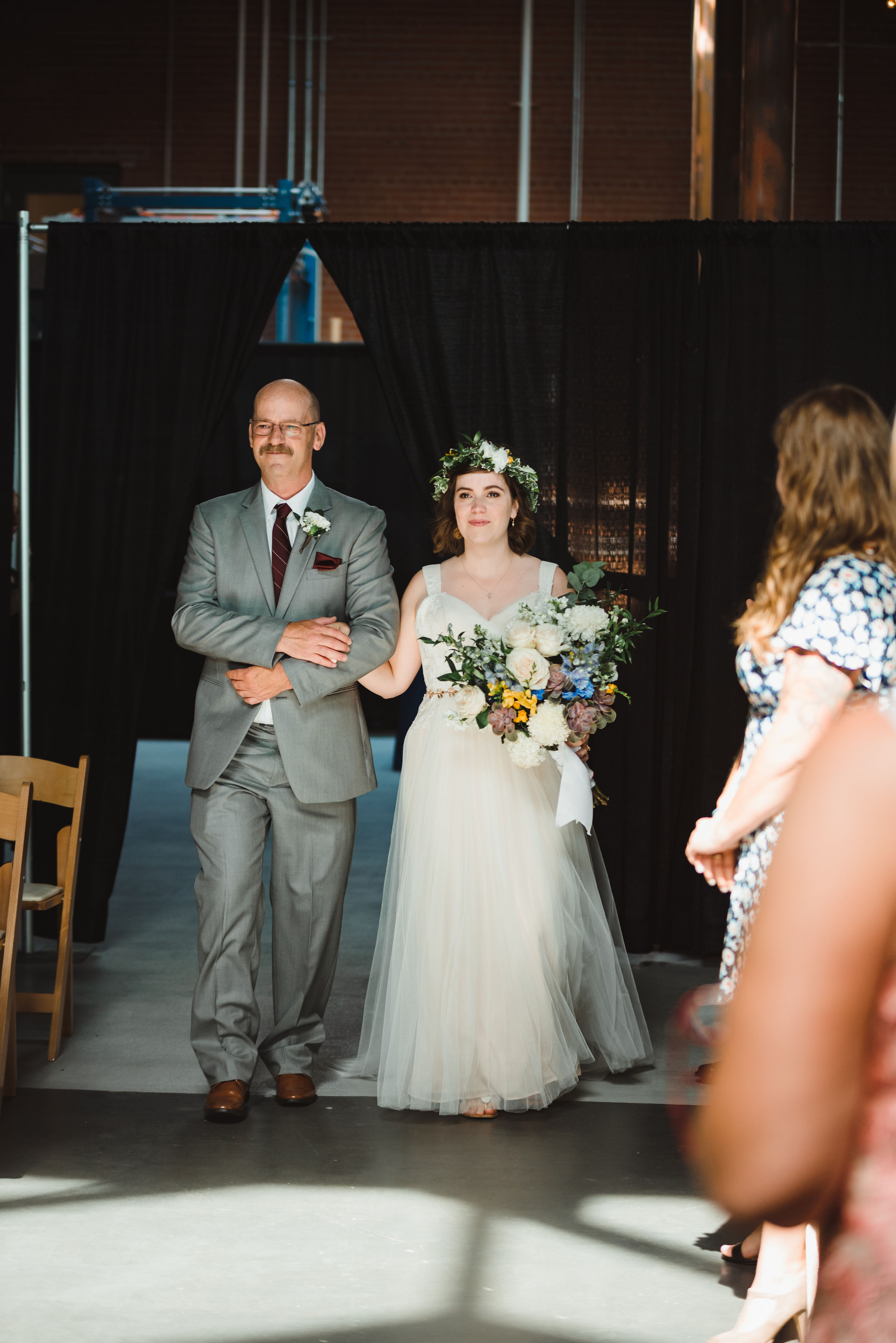 father of the bride escorting his daughter down the aisle Toronto Junction Craft Brewing wedding photography