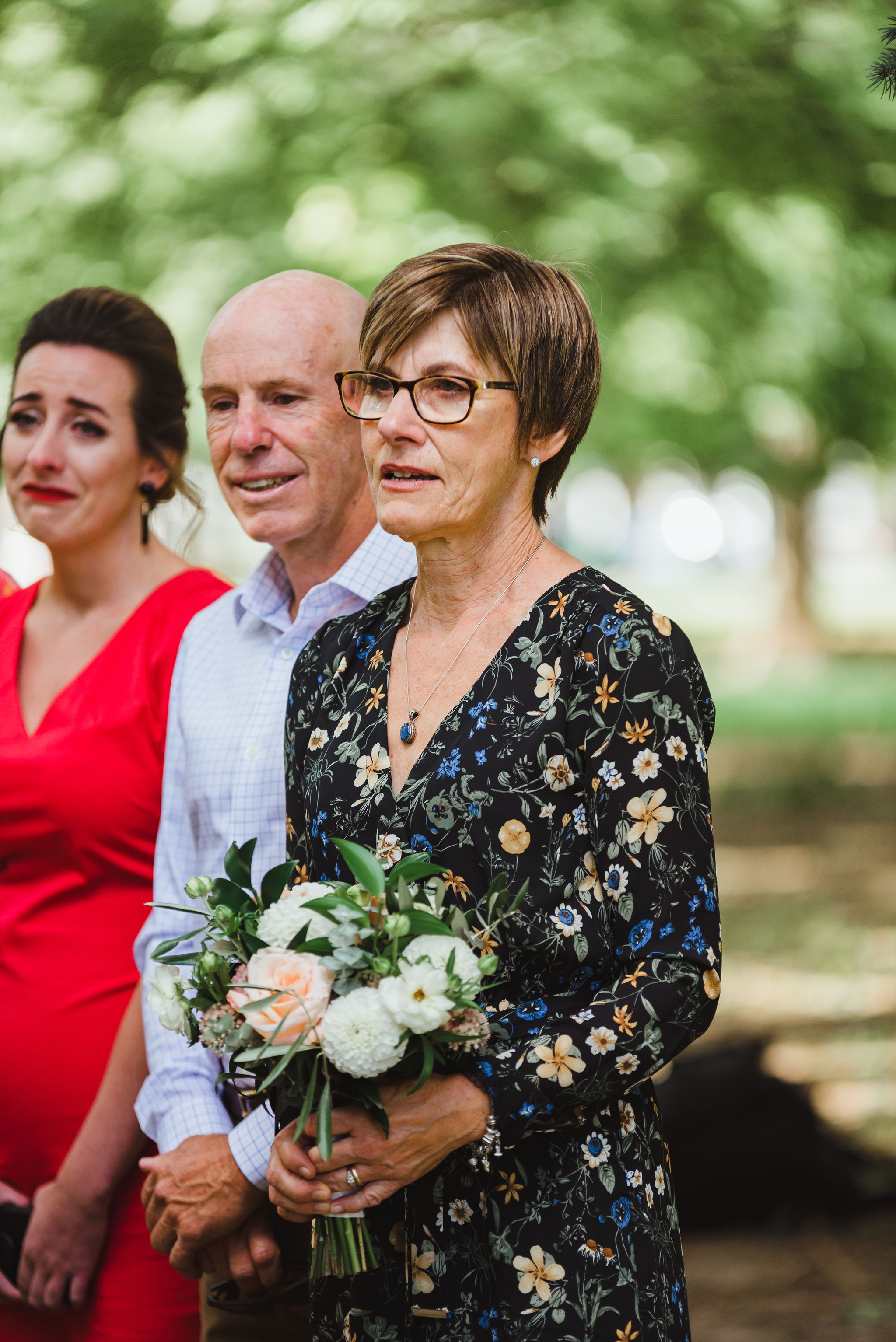 family members crying during wedding ceremony Trinity Bellwoods Park Toronto