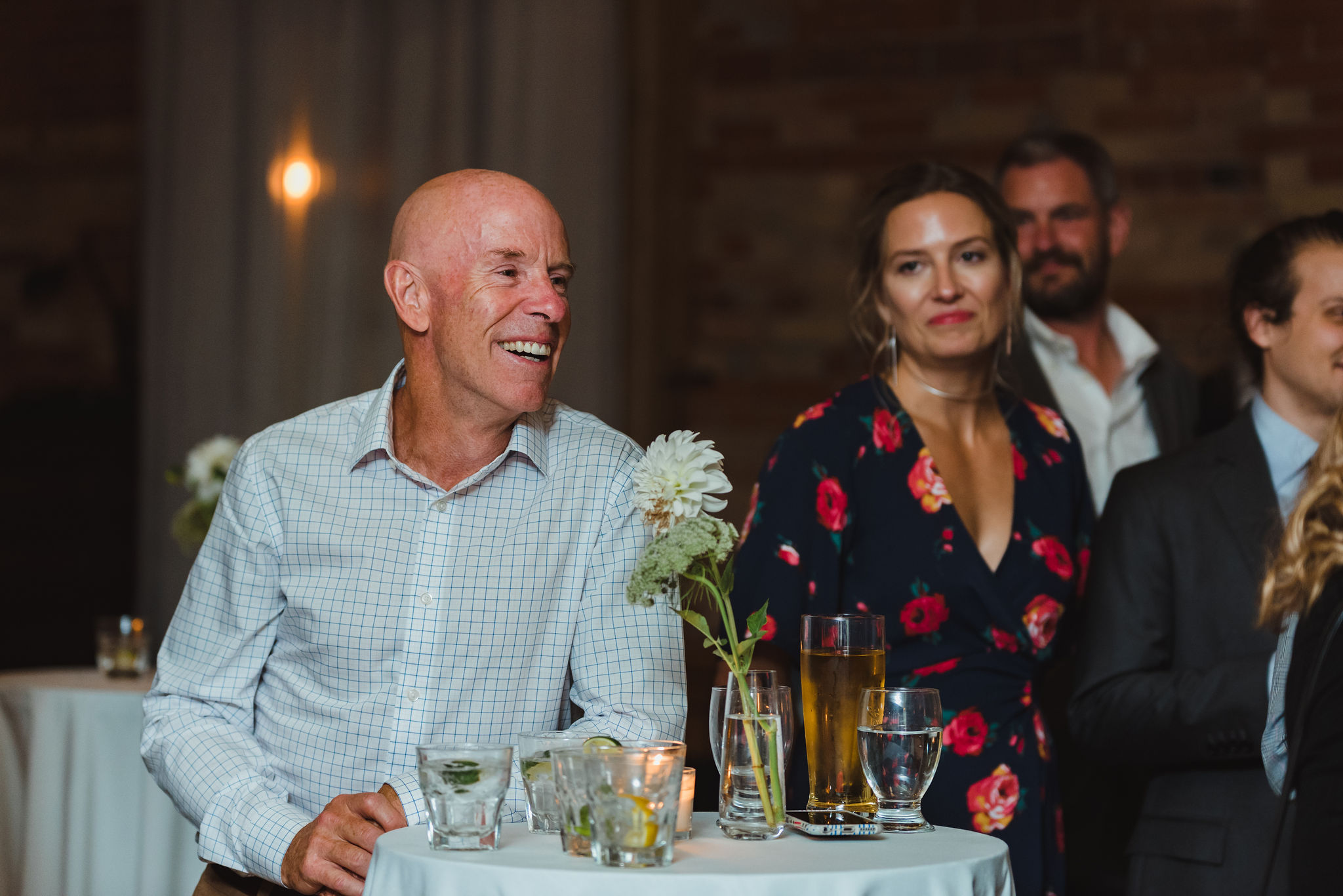 father of the bride laughing during wedding speeches at the Gladstone Hotel in Toronto