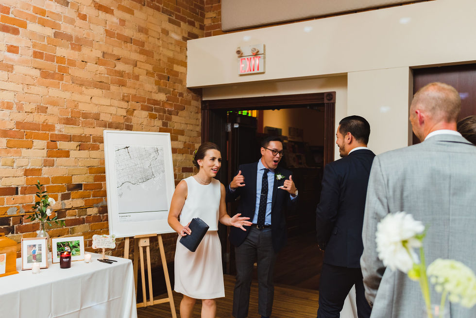 bride and groom enter the wedding reception at the Gladstone Hotel in Toronto