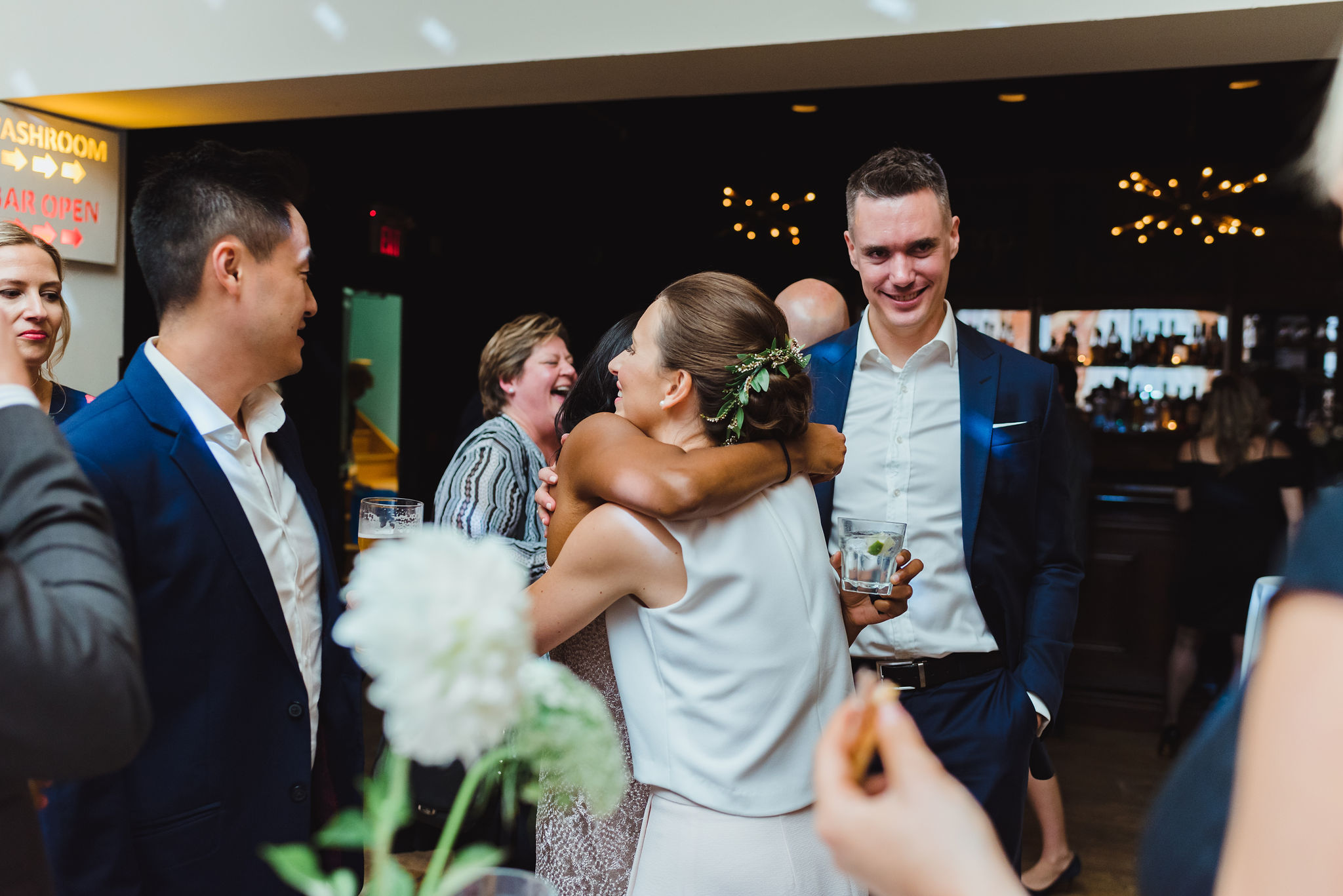 bride hugging a wedding guest during the reception at the Gladstone Hotel in Toronto