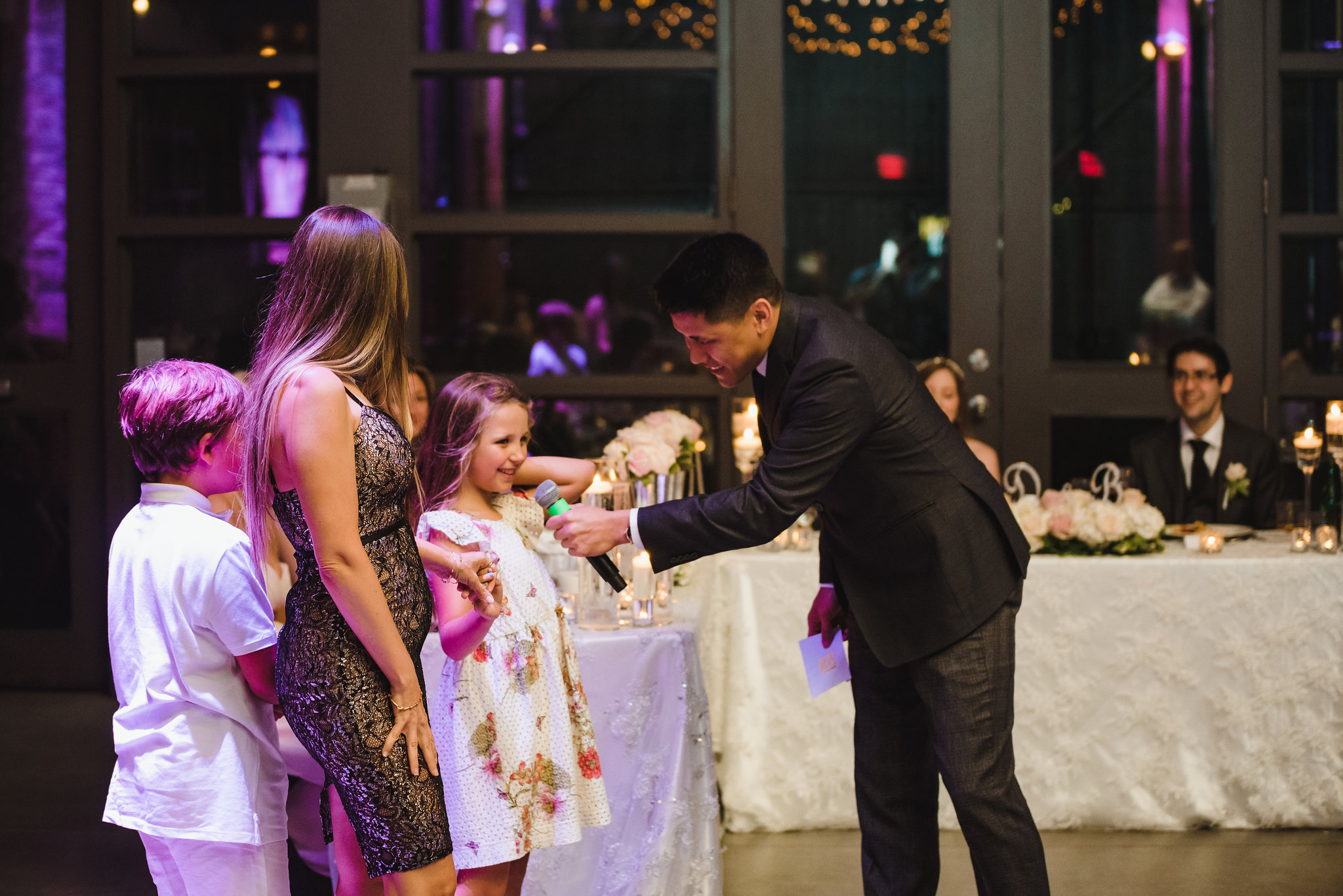 child speaking into microphone during a wedding at Steam Whistle Brewing Toronto Canada