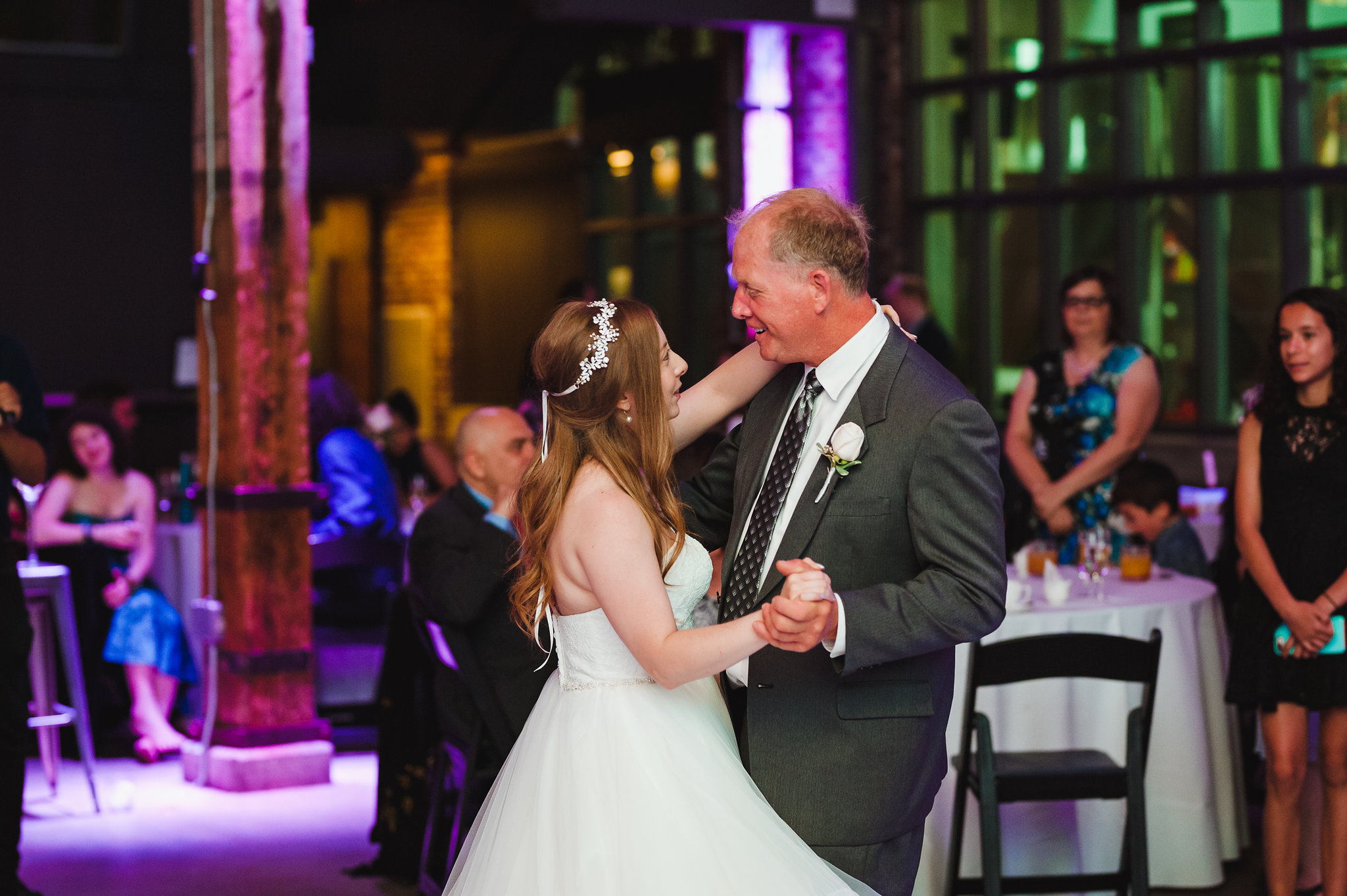 bride dancing with her father during wedding at Steam Whistle Brewing
