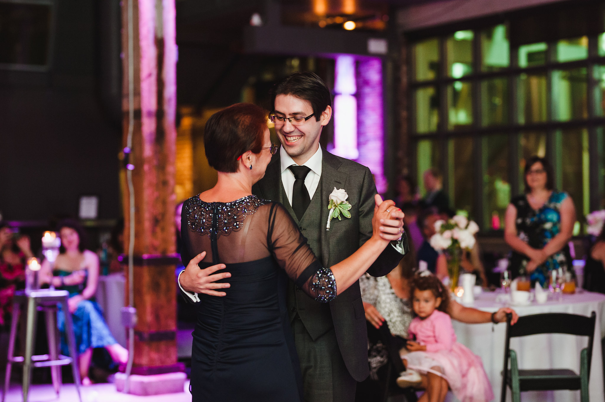 groom dancing with his mother during wedding at Steam Whistle Brewing