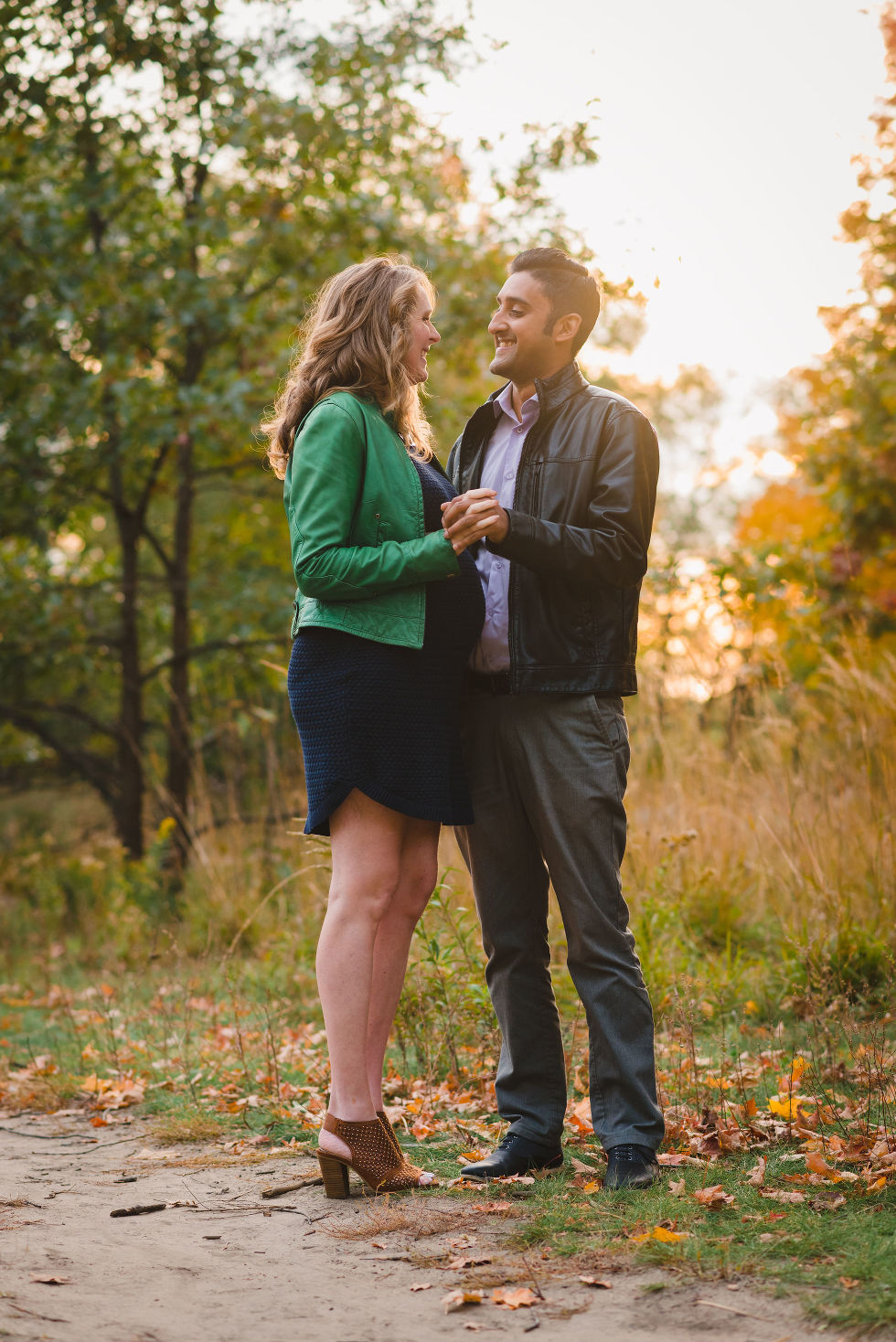 couple slow dancing in High Park, Toronto during autumn