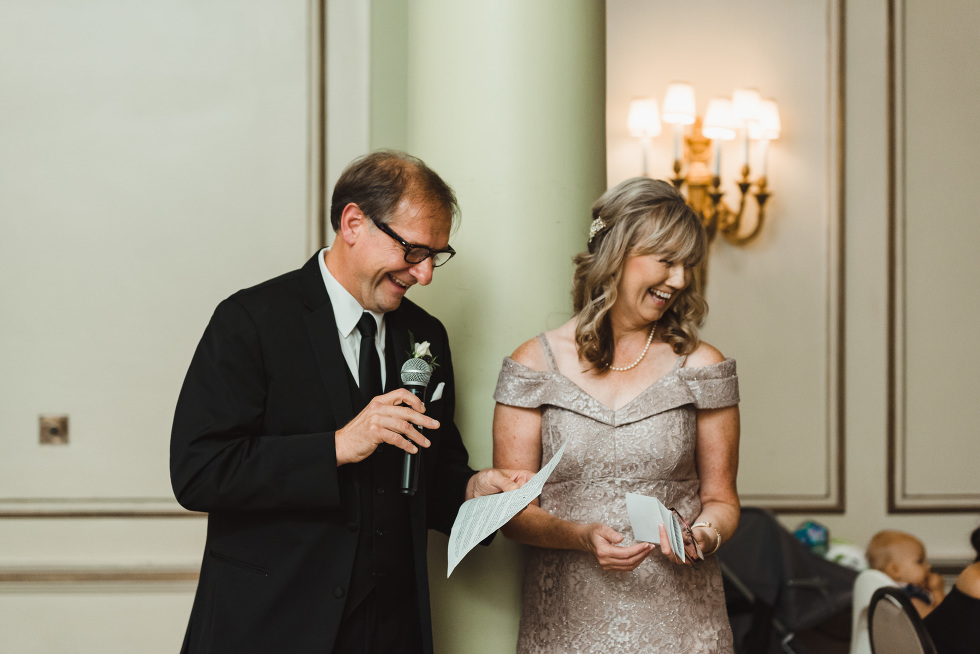 mother and father of the bride deliver speech during reception at the iconic University Club downtown Toronto wedding venue 