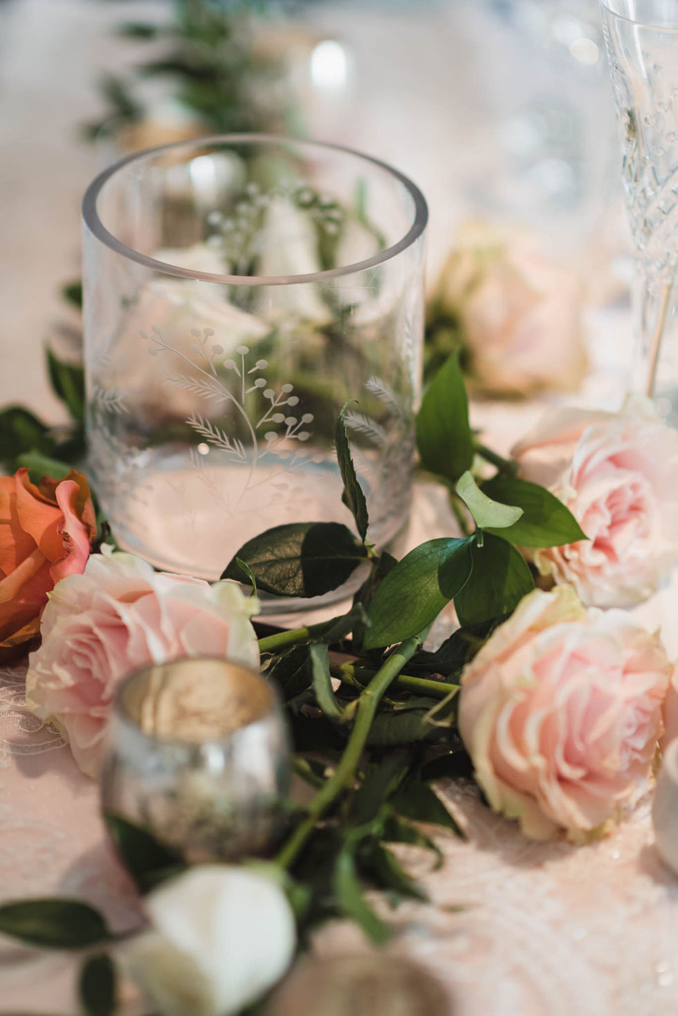 pink and green floral centrepiece for a wedding at La Paletta Mansion in Burlington Ontario