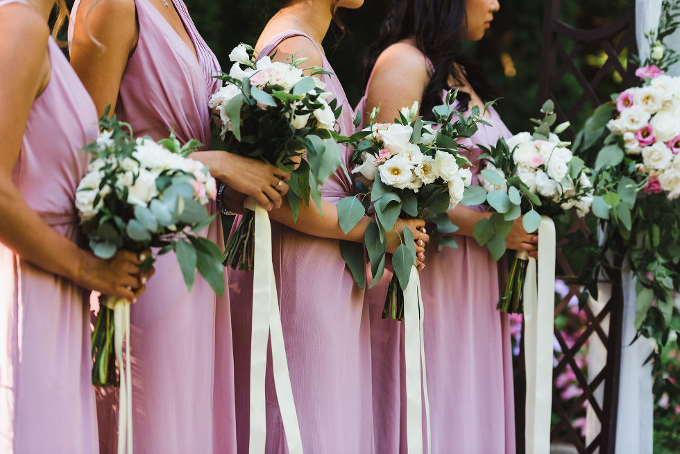 white and green floral bouquets with lavender bridesmaid dresses at Fantasy Farms in Toronto Ontario