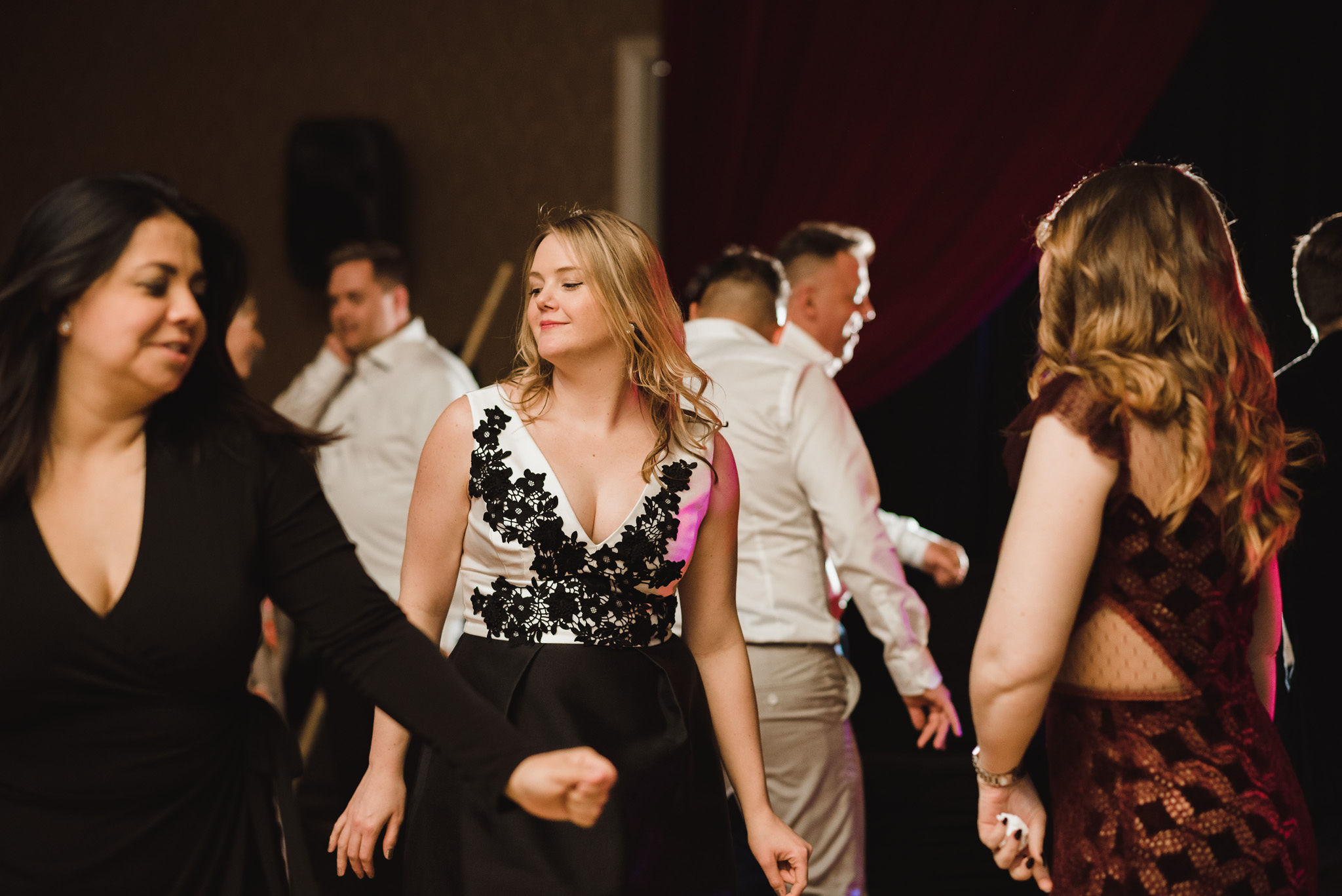 wedding guests dancing and having fun during a wedding reception at the Hilton Fallsview in Niagara Falls