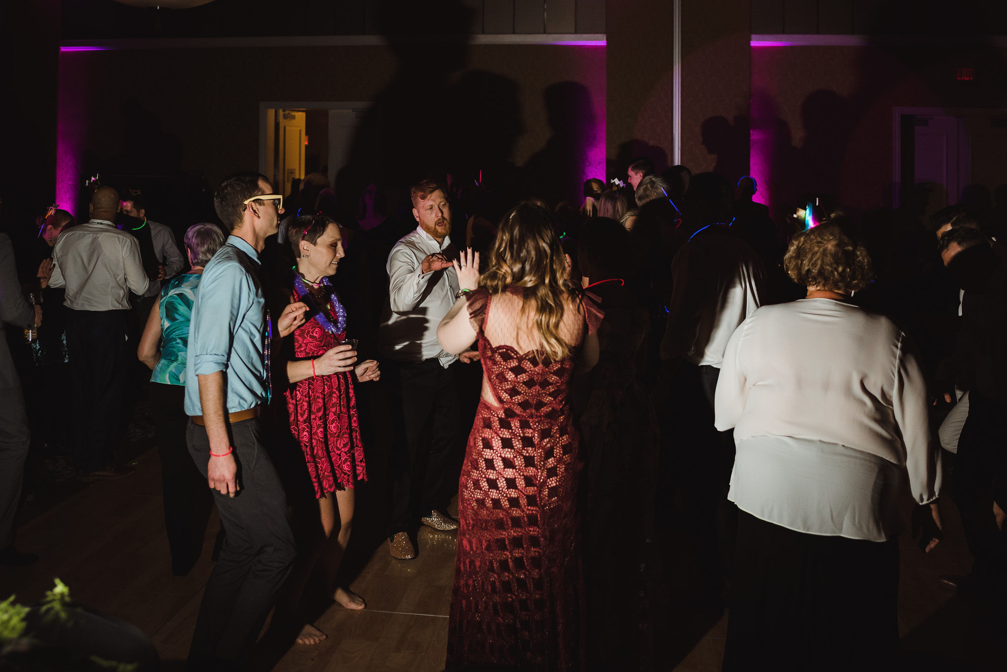 groom and his wedding guests dancing and laughing during a fun wedding at the Hilton Fallsview in Niagara Falls