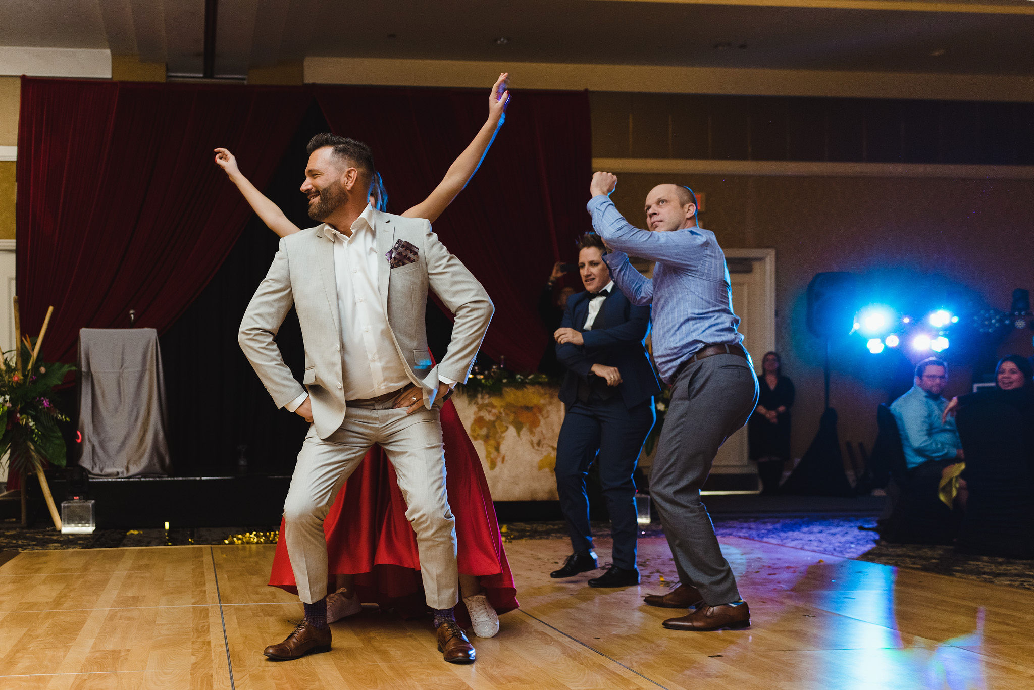 guests dancing during a fun wedding reception at the Hilton Fallsview in Niagara Falls