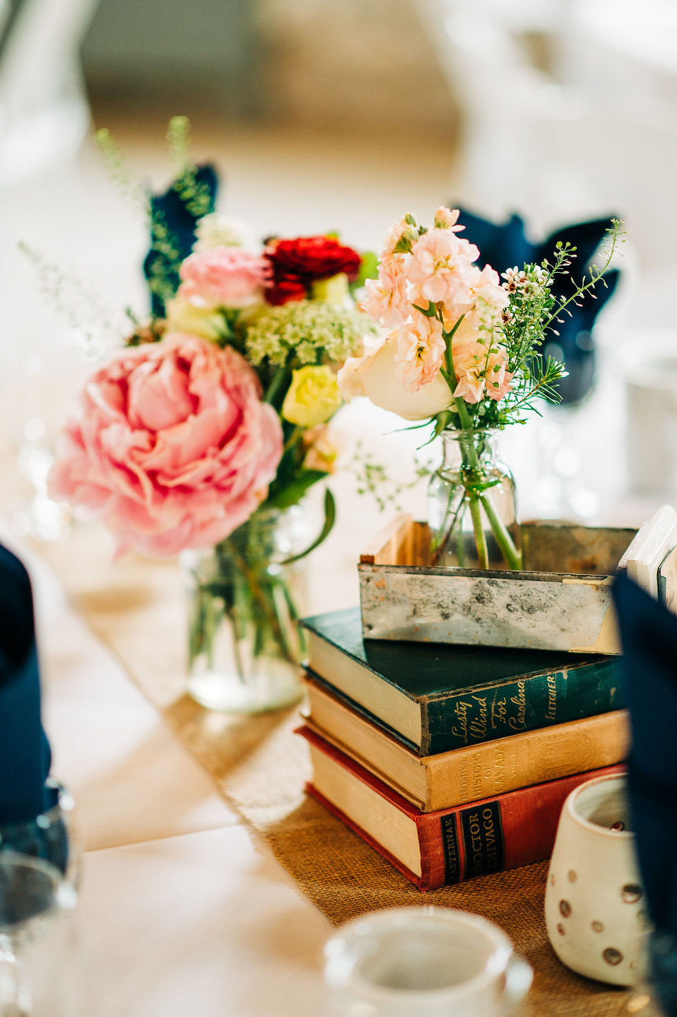 colourful floral centrepiece on a table during charming southern style wedding at Ruthven Park National Historic Site