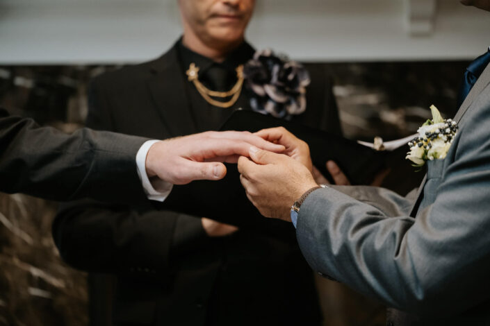 couple exchanging rings
