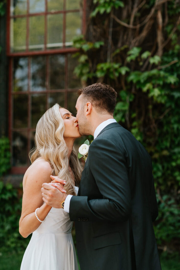 wedding couple kissing