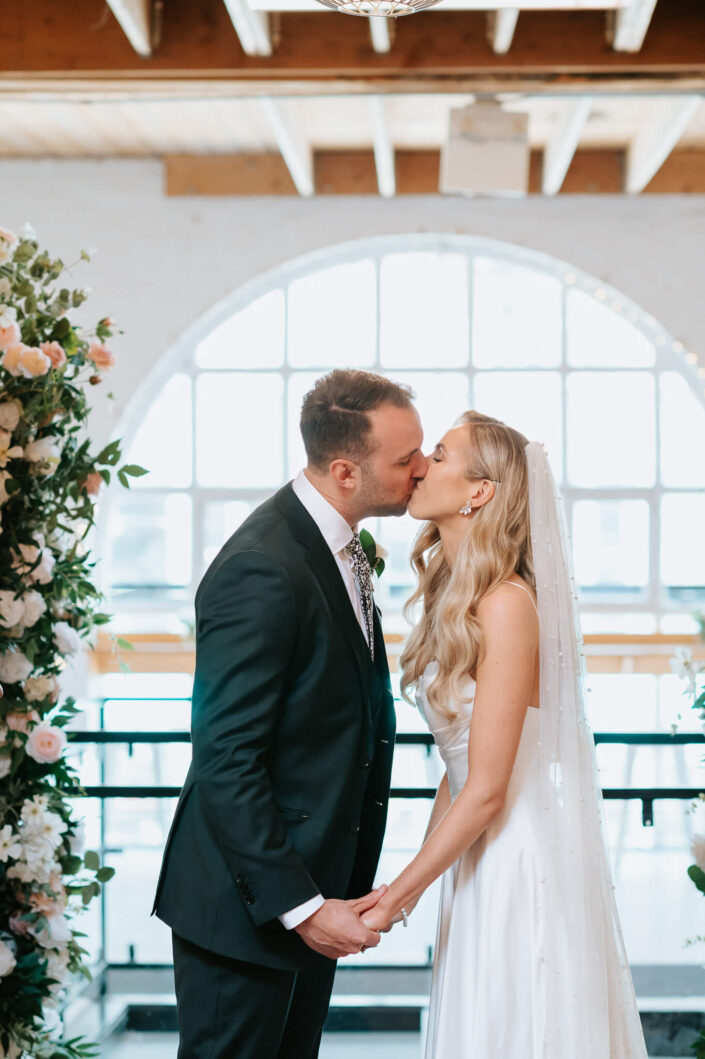 wedding couple kissing
