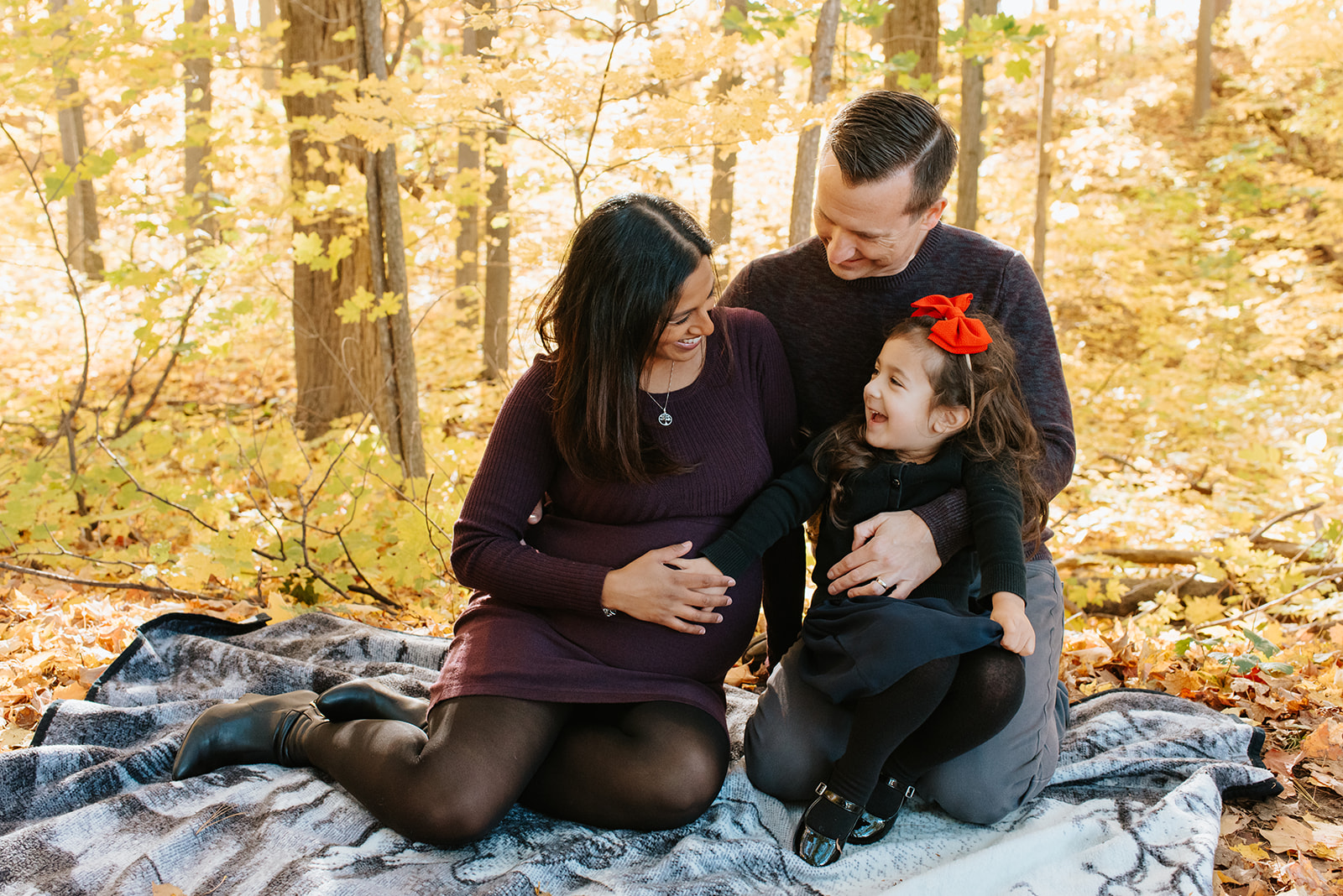 Fall family photos at Scottsdale Farm with yellow leaves